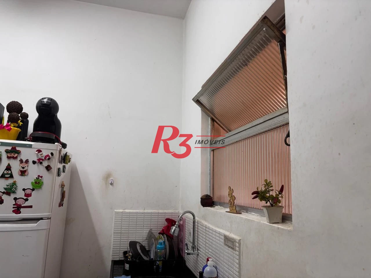 Apartamento com 2 dormitórios à venda, 54 m² por R$ 300.000,00 - Centro - São Vicente/SP