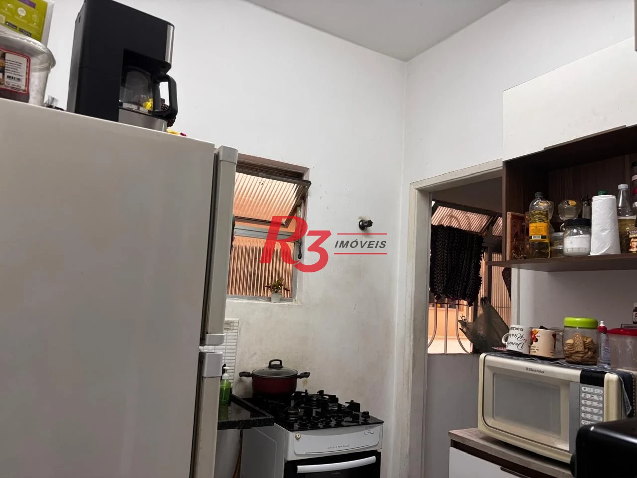 Apartamento com 2 dormitórios à venda, 54 m² por R$ 300.000,00 - Centro - São Vicente/SP
