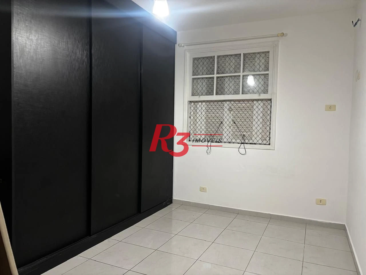 Apartamento com 1 dormitório para alugar, 65 m² por R$ 3.000,00/mês - Aparecida - Santos/SP