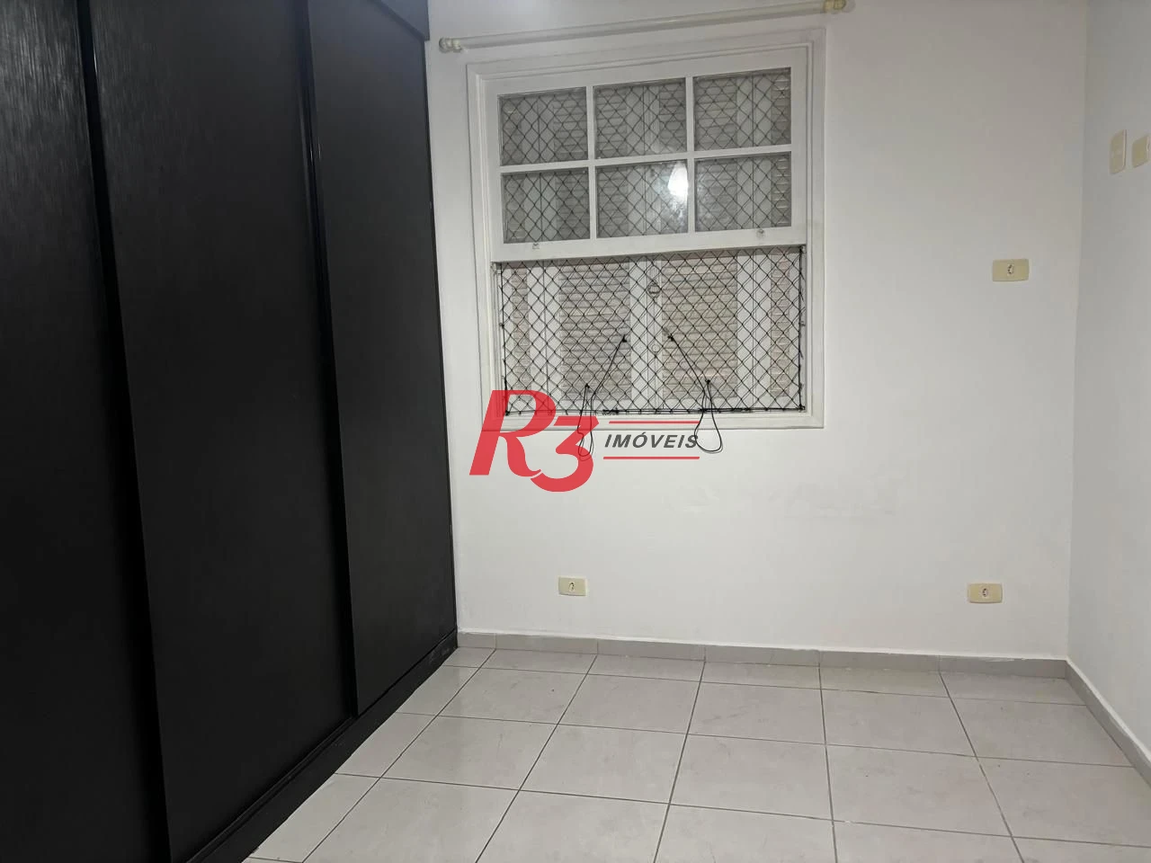 Apartamento com 1 dormitório para alugar, 65 m² por R$ 3.000,00/mês - Aparecida - Santos/SP