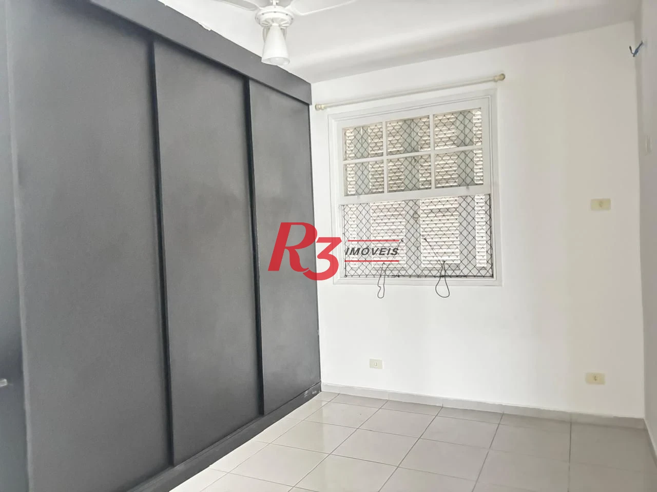 Apartamento com 1 dormitório para alugar, 65 m² por R$ 3.000,00/mês - Aparecida - Santos/SP