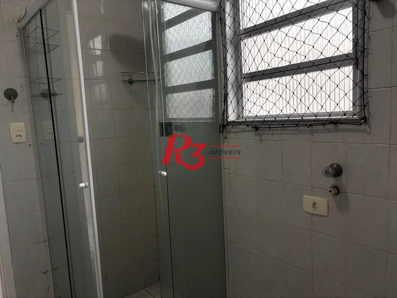 Apartamento com 1 dormitório para alugar, 65 m² por R$ 3.000,00/mês - Aparecida - Santos/SP
