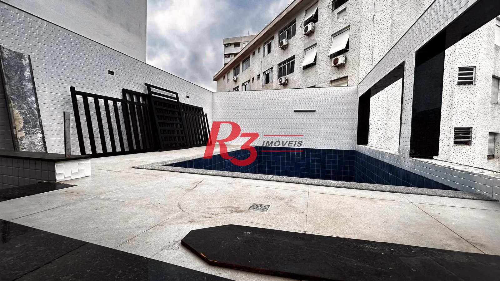 Casa com 3 dormitórios à venda, 244 m² por R$ 1.700.000,00 - Embaré - Santos/SP