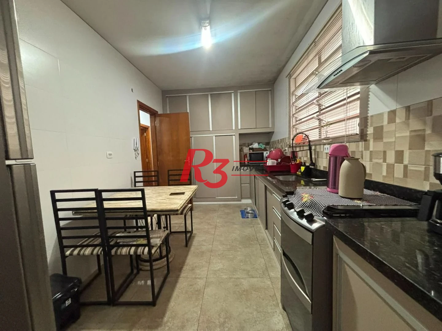 Apartamento com 3 dormitórios à venda, 90 m² por R$ 450.000,00 - Gonzaga - Santos/SP