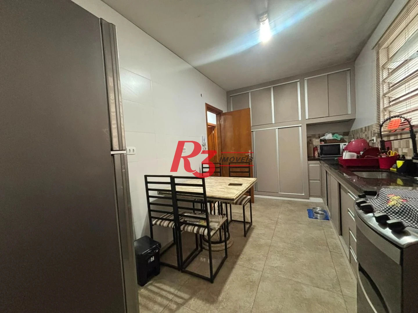 Apartamento com 3 dormitórios à venda, 90 m² por R$ 450.000,00 - Gonzaga - Santos/SP
