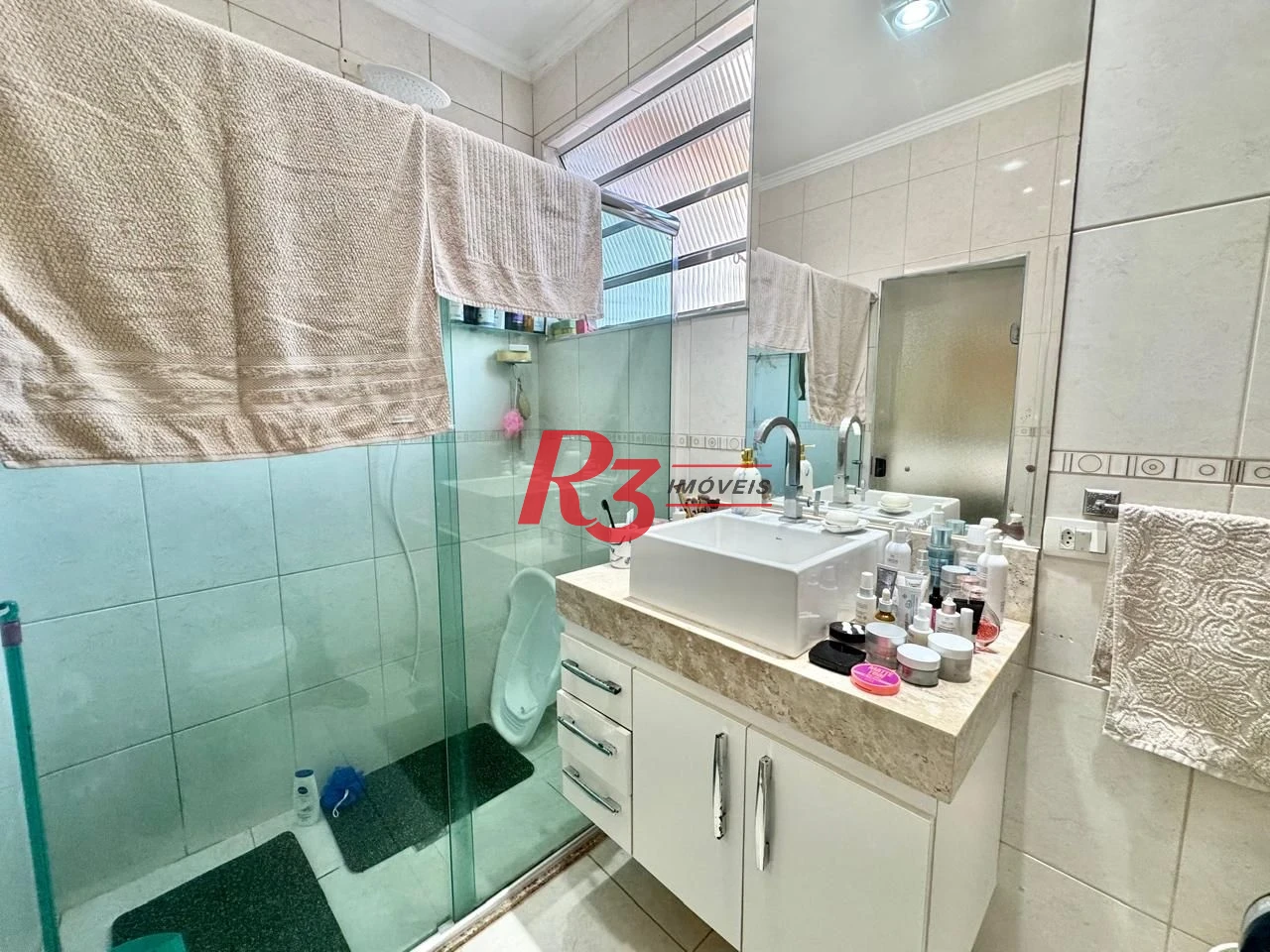 Sobrado à venda, 150 m² por R$ 1.500.000,00 - Gonzaga - Santos/SP