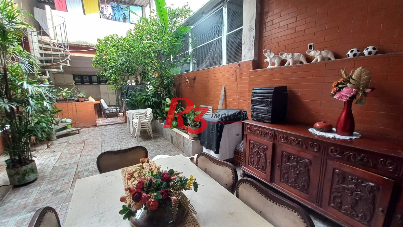 Casa com 3 dormitórios à venda, 142 m² por R$ 680.000,00 - Vila Mathias - Santos/SP