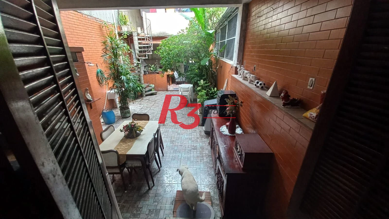 Casa com 3 dormitórios à venda, 142 m² por R$ 680.000,00 - Vila Mathias - Santos/SP