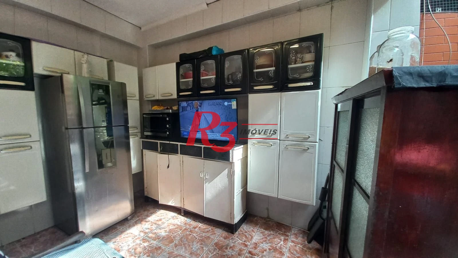 Casa com 3 dormitórios à venda, 142 m² por R$ 680.000,00 - Vila Mathias - Santos/SP