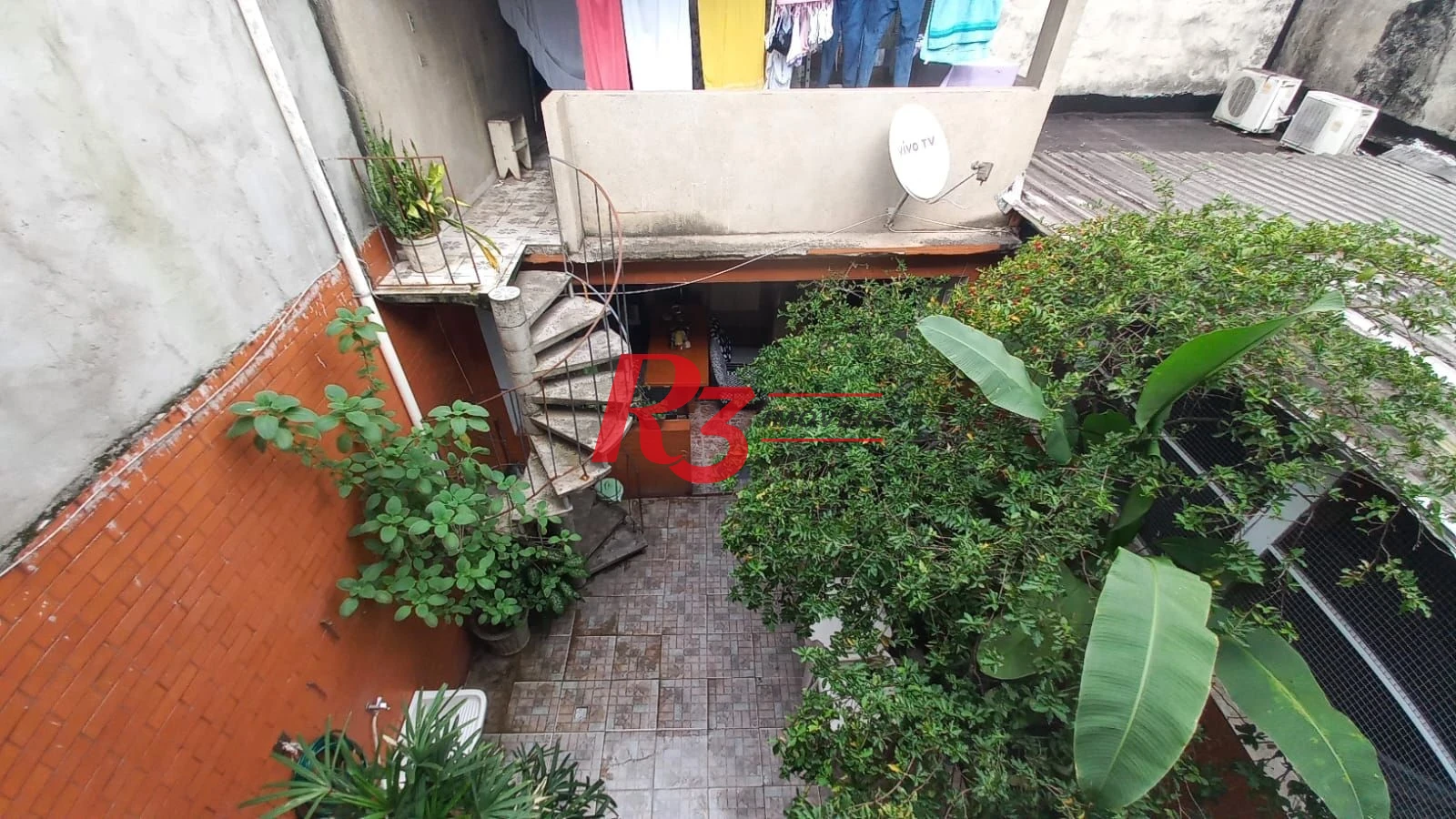 Casa com 3 dormitórios à venda, 142 m² por R$ 680.000,00 - Vila Mathias - Santos/SP