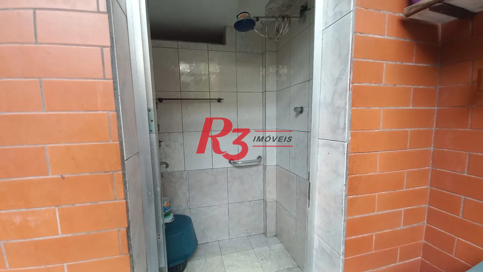 Casa com 3 dormitórios à venda, 142 m² por R$ 680.000,00 - Vila Mathias - Santos/SP
