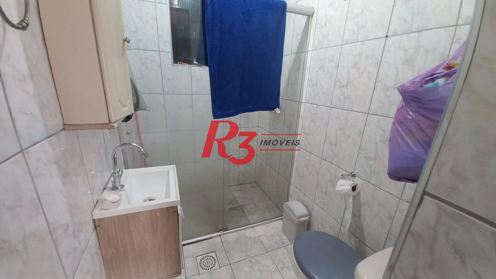 Casa com 3 dormitórios à venda, 142 m² por R$ 680.000,00 - Vila Mathias - Santos/SP