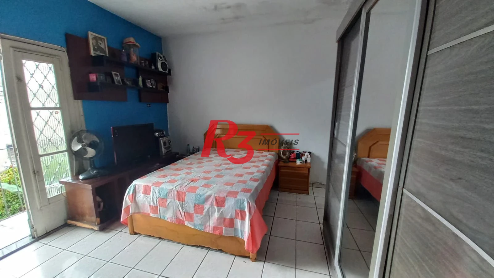 Casa com 3 dormitórios à venda, 142 m² por R$ 680.000,00 - Vila Mathias - Santos/SP