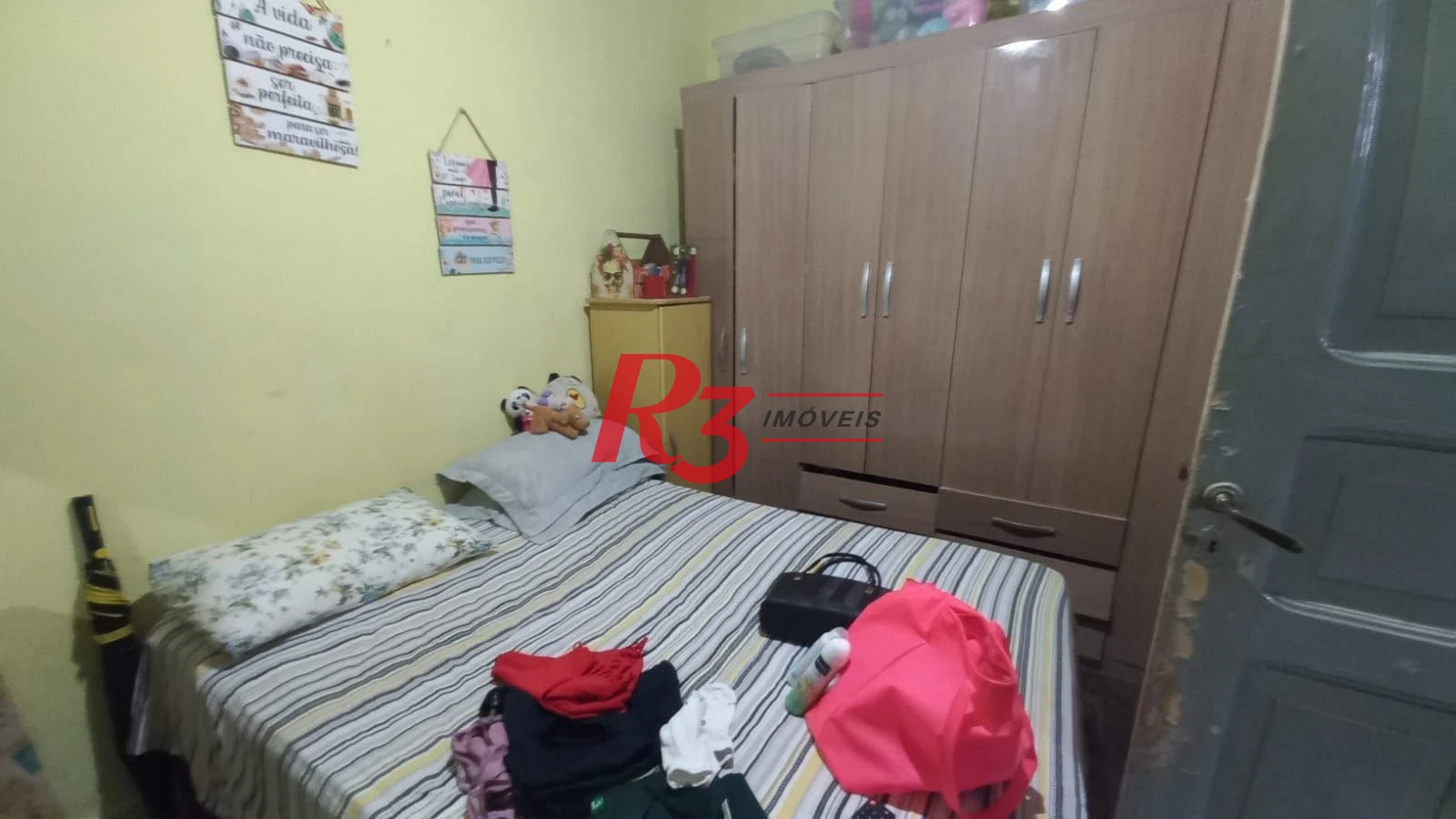 Casa com 3 dormitórios à venda, 142 m² por R$ 680.000,00 - Vila Mathias - Santos/SP