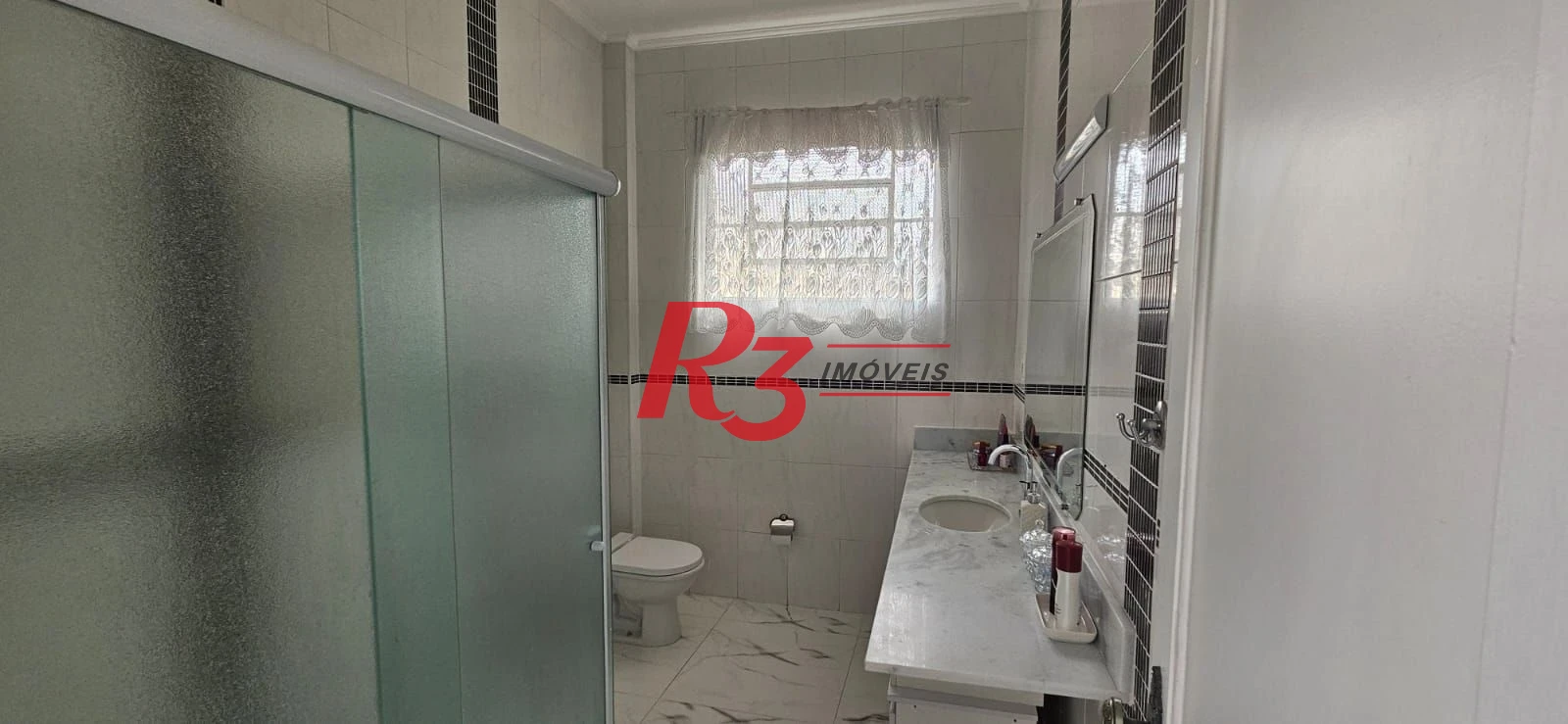 Sobrado com 3 dormitórios para alugar, 146 m² por R$ 10.500,00/mês - Encruzilhada - Santos/SP