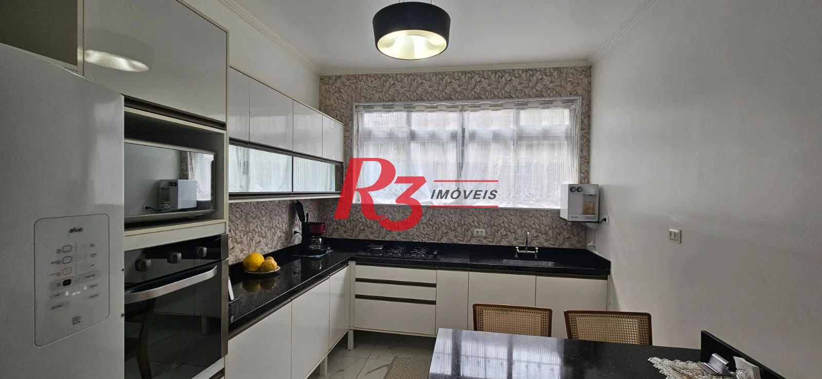 Sobrado com 3 dormitórios para alugar, 146 m² por R$ 10.500,00/mês - Encruzilhada - Santos/SP