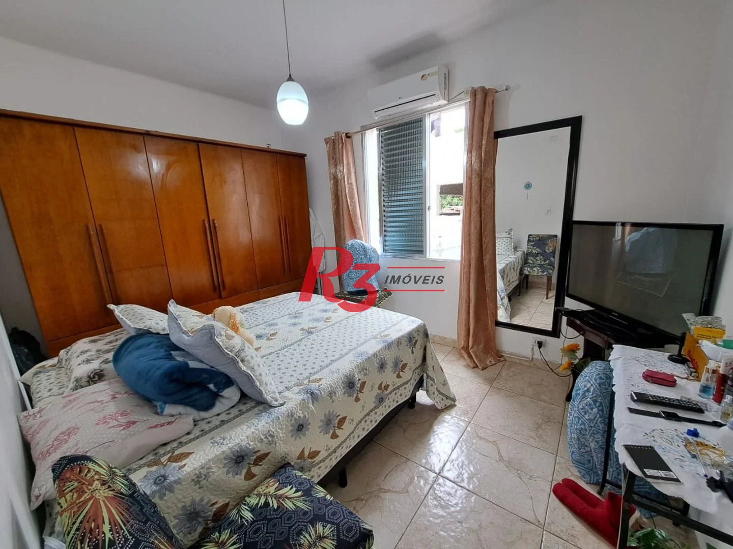 Apartamento com 2 dormitórios à venda, 70 m² por R$ 390.000,00 - Embaré - Santos/SP