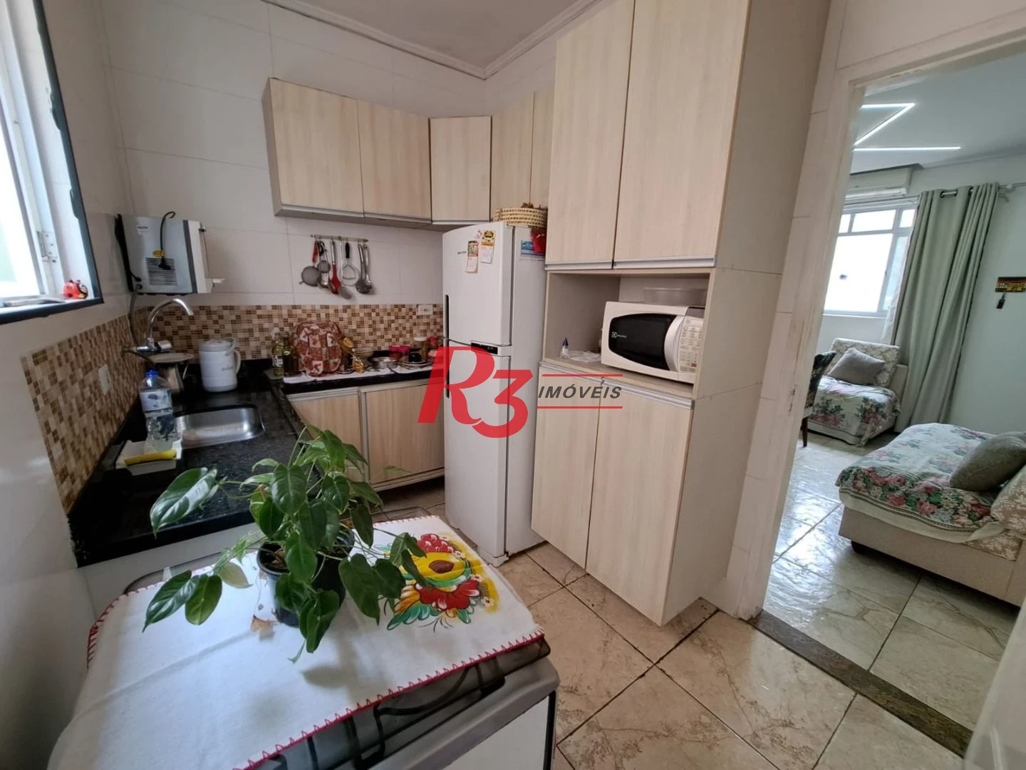 Apartamento com 2 dormitórios à venda, 70 m² por R$ 390.000,00 - Embaré - Santos/SP