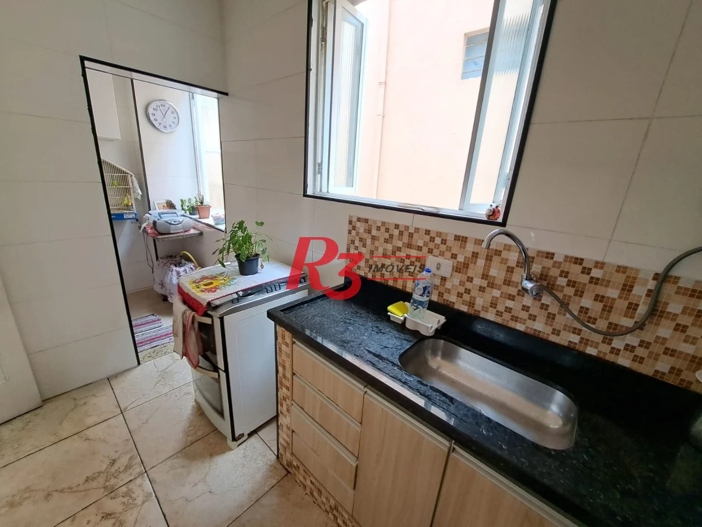 Apartamento com 2 dormitórios à venda, 70 m² por R$ 390.000,00 - Embaré - Santos/SP