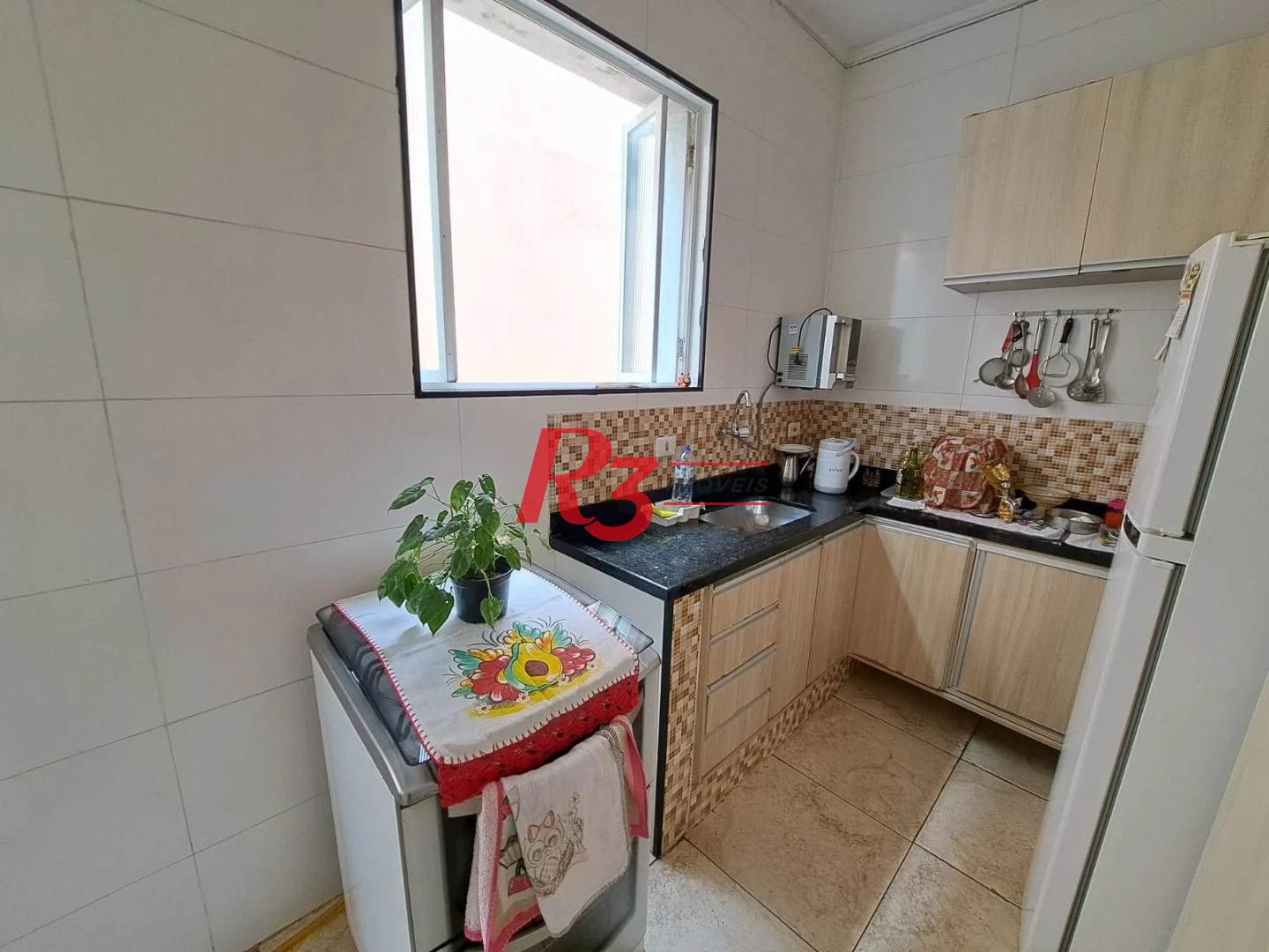 Apartamento com 2 dormitórios à venda, 70 m² por R$ 390.000,00 - Embaré - Santos/SP