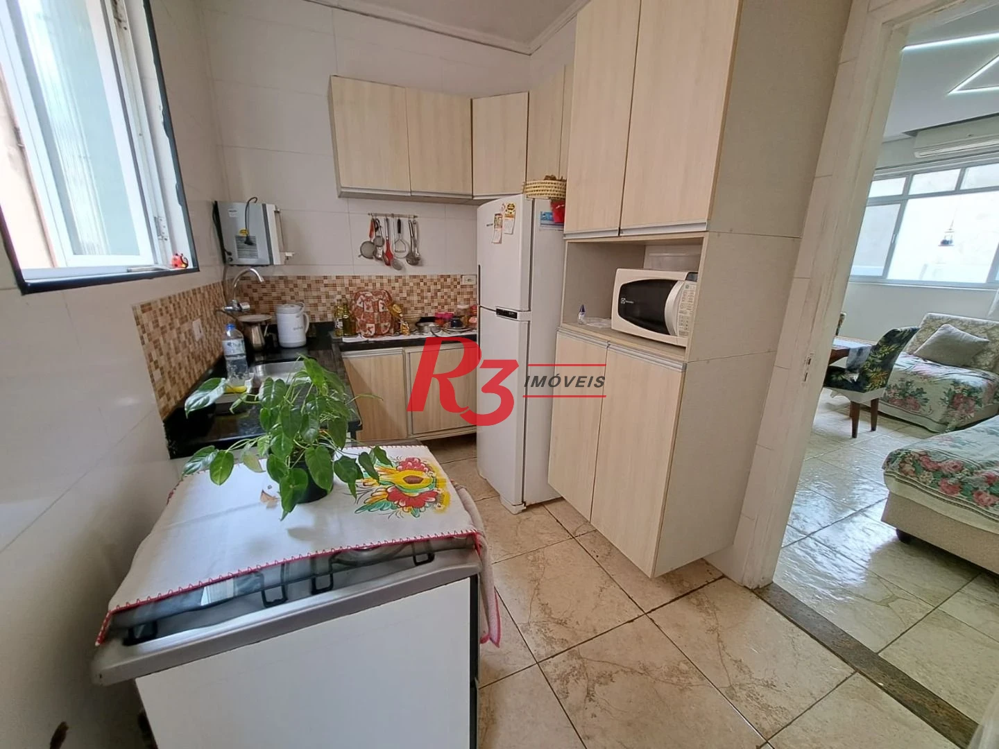 Apartamento com 2 dormitórios à venda, 70 m² por R$ 390.000,00 - Embaré - Santos/SP