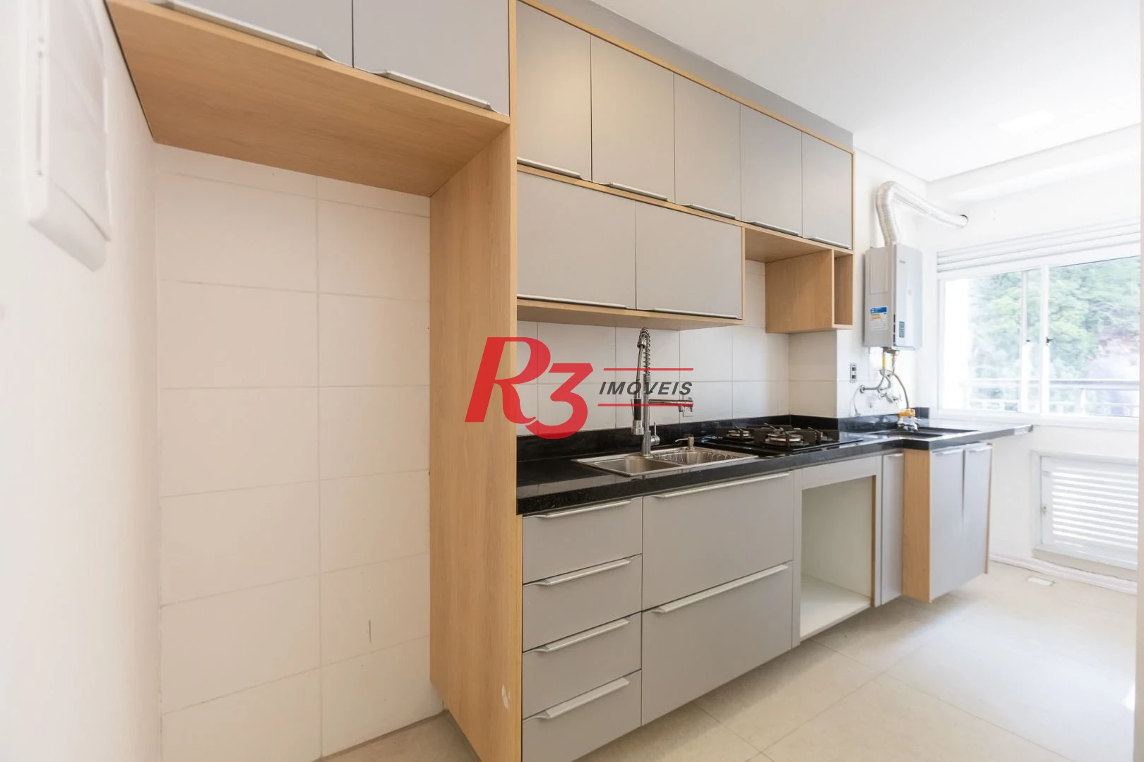 Apartamento com 2 dormitórios à venda, 62 m² por R$ 910.000,00 - Marapé - Santos/SP
