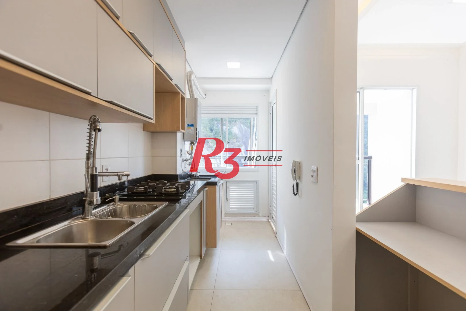 Apartamento com 2 dormitórios à venda, 62 m² por R$ 910.000,00 - Marapé - Santos/SP