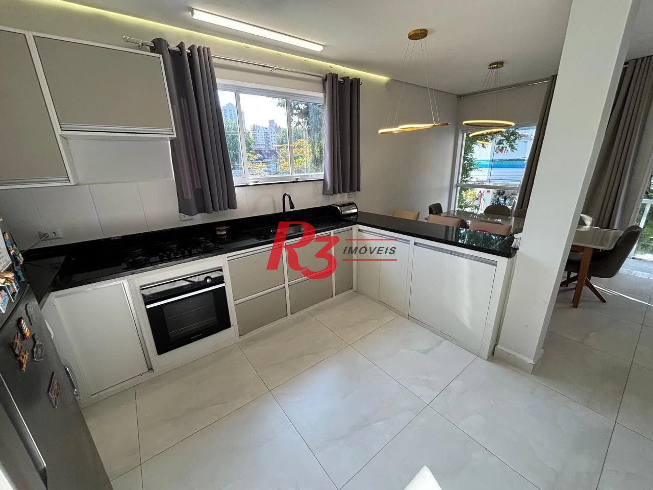 Casa com 3 dormitórios à venda, 106 m² por R$ 1.175.000,00 - Campo Grande - Santos/SP