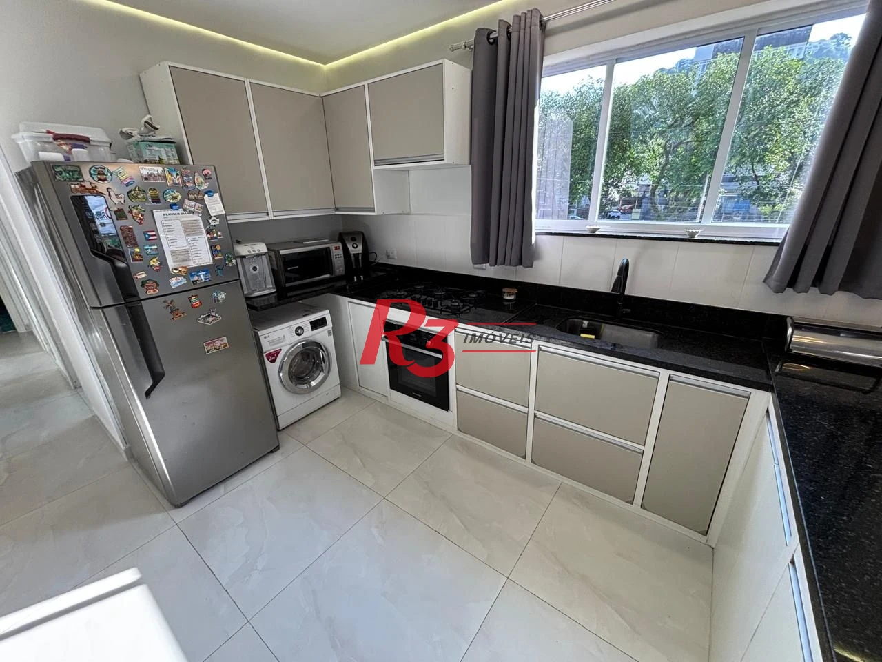 Casa com 3 dormitórios à venda, 106 m² por R$ 1.175.000,00 - Campo Grande - Santos/SP