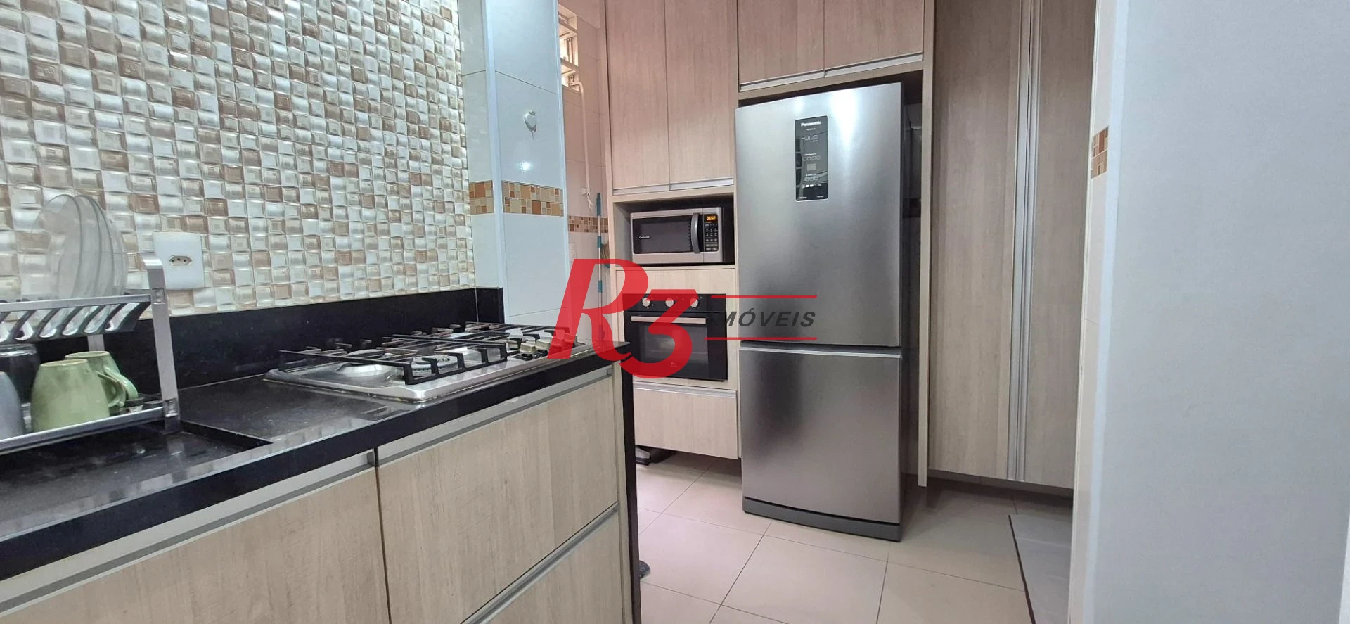 Casa com 2 dormitórios à venda, 68 m² por R$ 500.000,00 - Macuco - Santos/SP