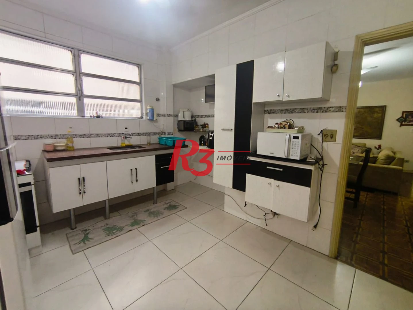 Apartamento com 2 dormitórios à venda, 101 m² por R$ 700.000,00 - Gonzaga - Santos/SP