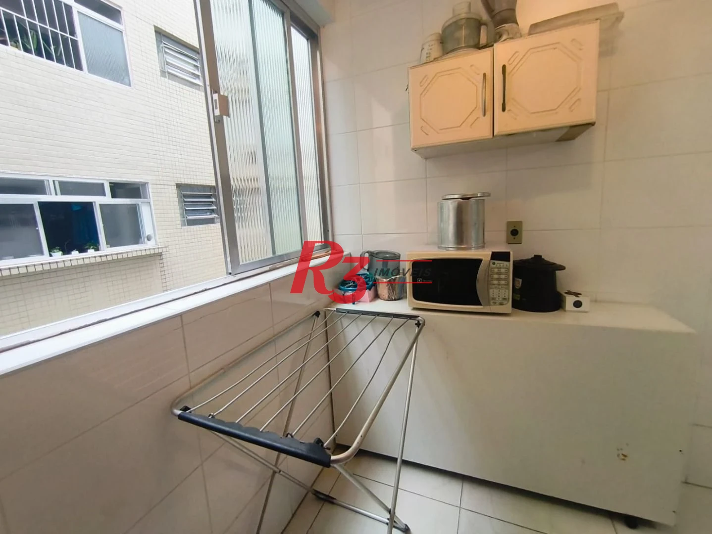 Apartamento com 2 dormitórios à venda, 101 m² por R$ 700.000,00 - Gonzaga - Santos/SP