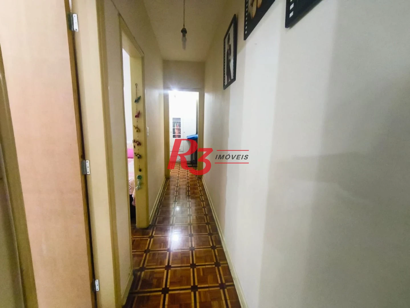 Apartamento com 2 dormitórios à venda, 101 m² por R$ 700.000,00 - Gonzaga - Santos/SP