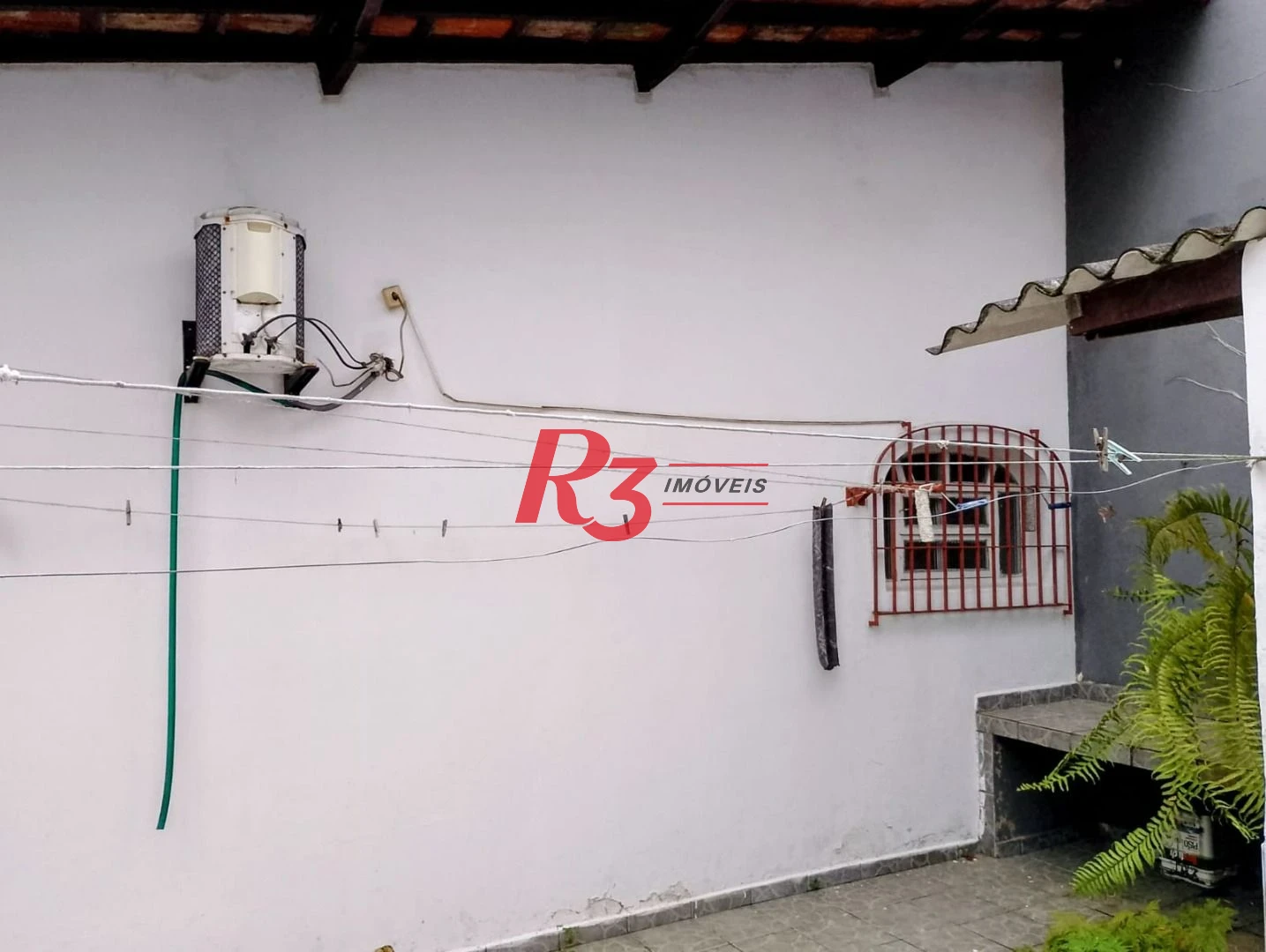 Casa com 2 dormitórios à venda, 115 m² por R$ 670.000,00 - Aviação - Praia Grande/SP