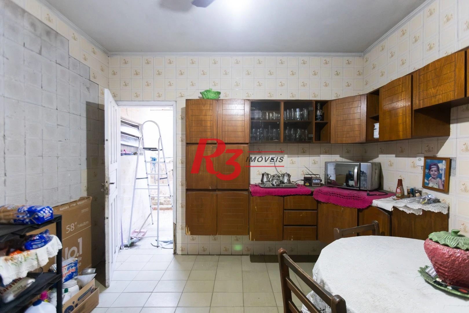 Sobrado com 3 dormitórios à venda, 220 m² por R$ 690.000,00 - Estuário - Santos/SP
