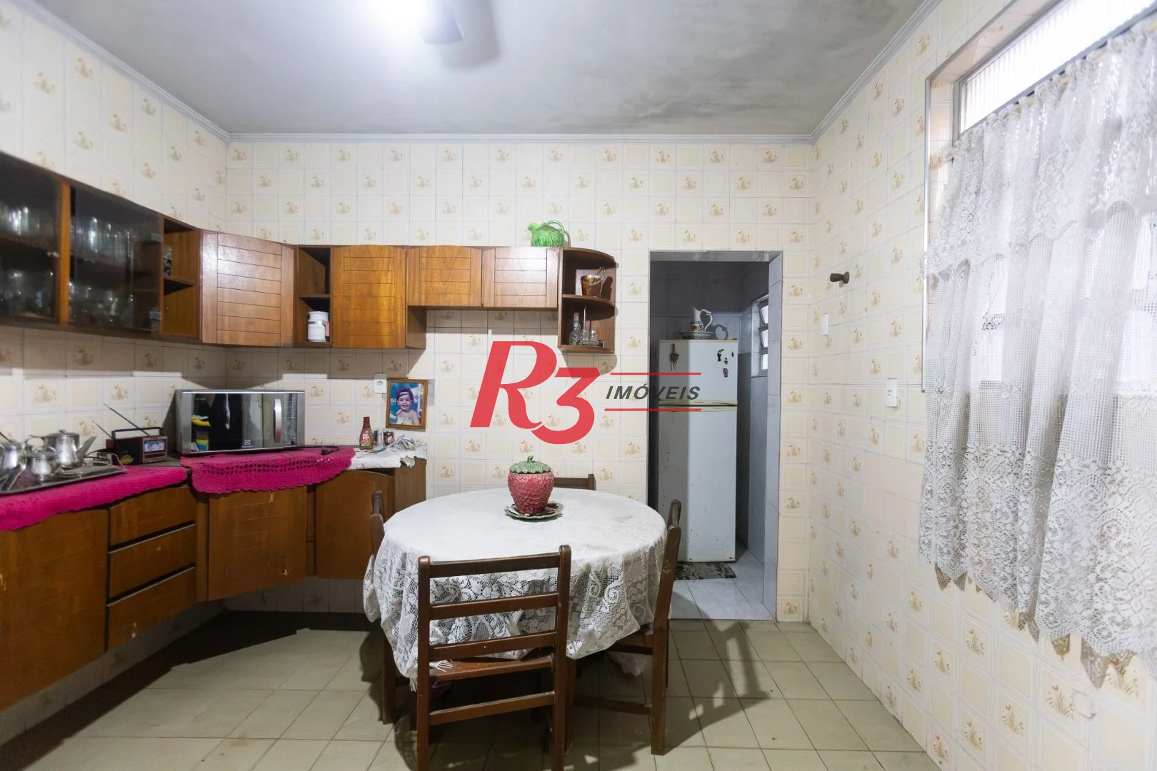 Sobrado com 3 dormitórios à venda, 220 m² por R$ 690.000,00 - Estuário - Santos/SP