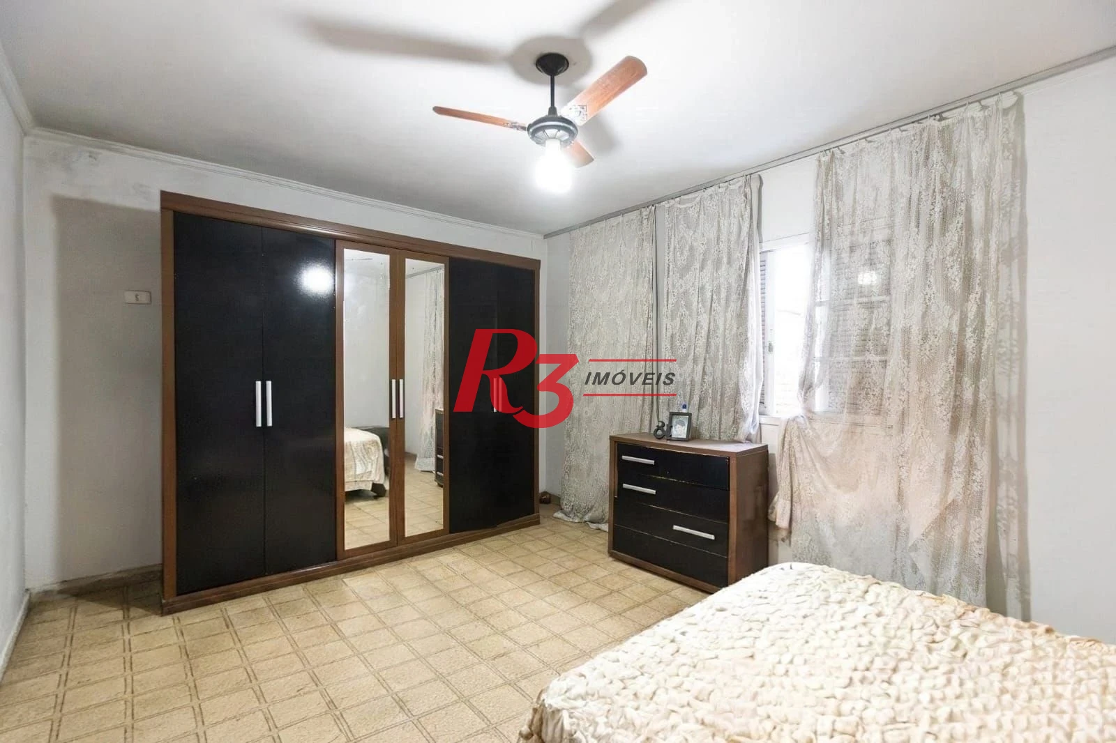 Sobrado com 3 dormitórios à venda, 220 m² por R$ 690.000,00 - Estuário - Santos/SP