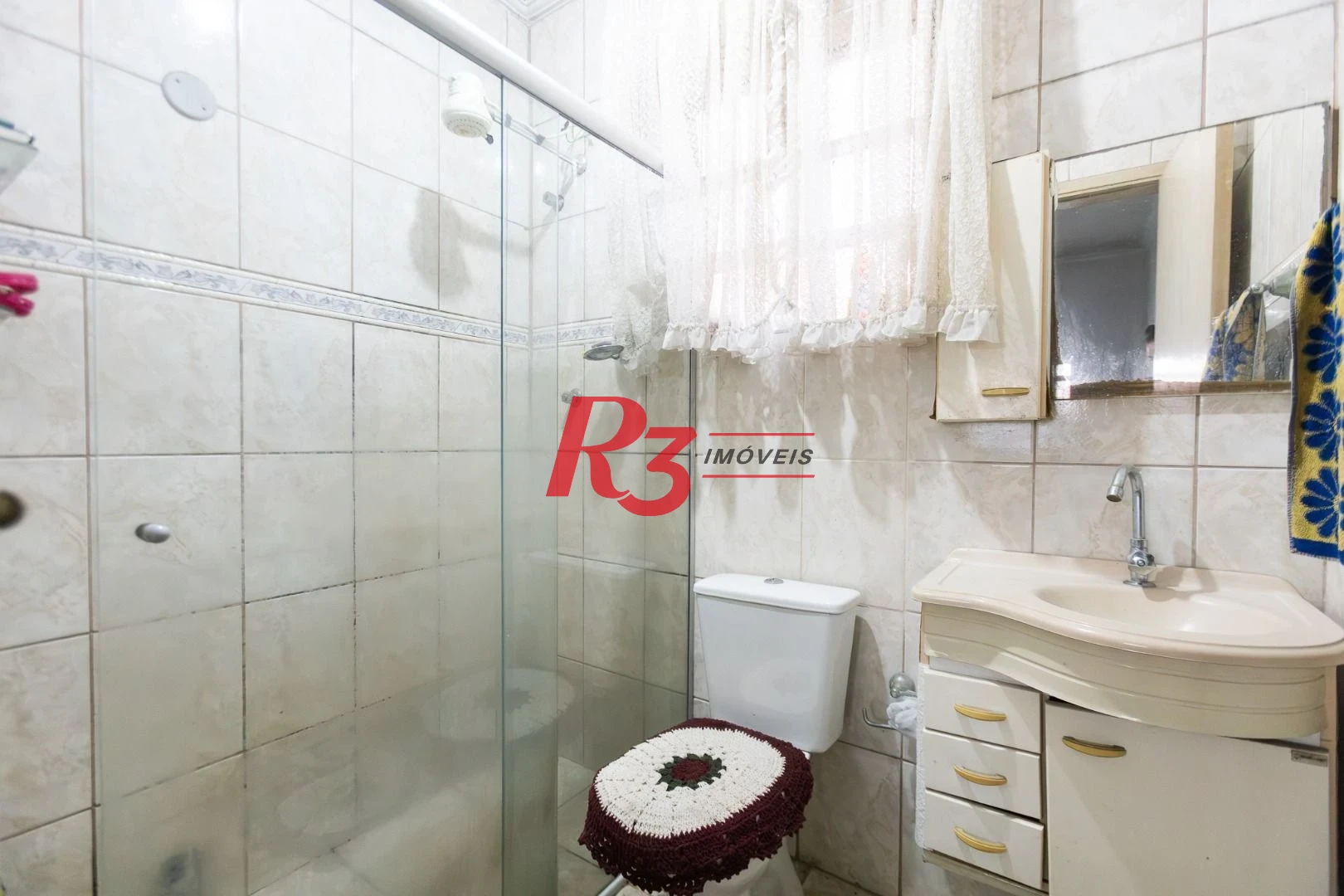 Sobrado com 3 dormitórios à venda, 220 m² por R$ 690.000,00 - Estuário - Santos/SP
