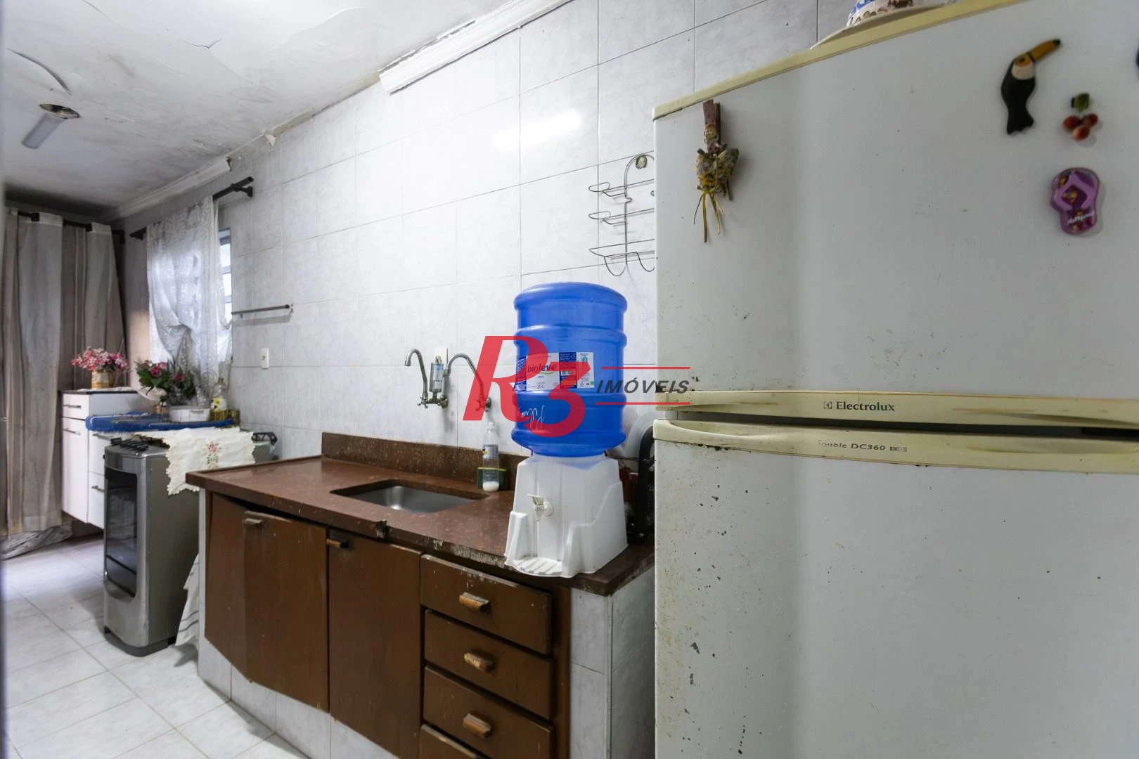 Sobrado com 3 dormitórios à venda, 220 m² por R$ 690.000,00 - Estuário - Santos/SP