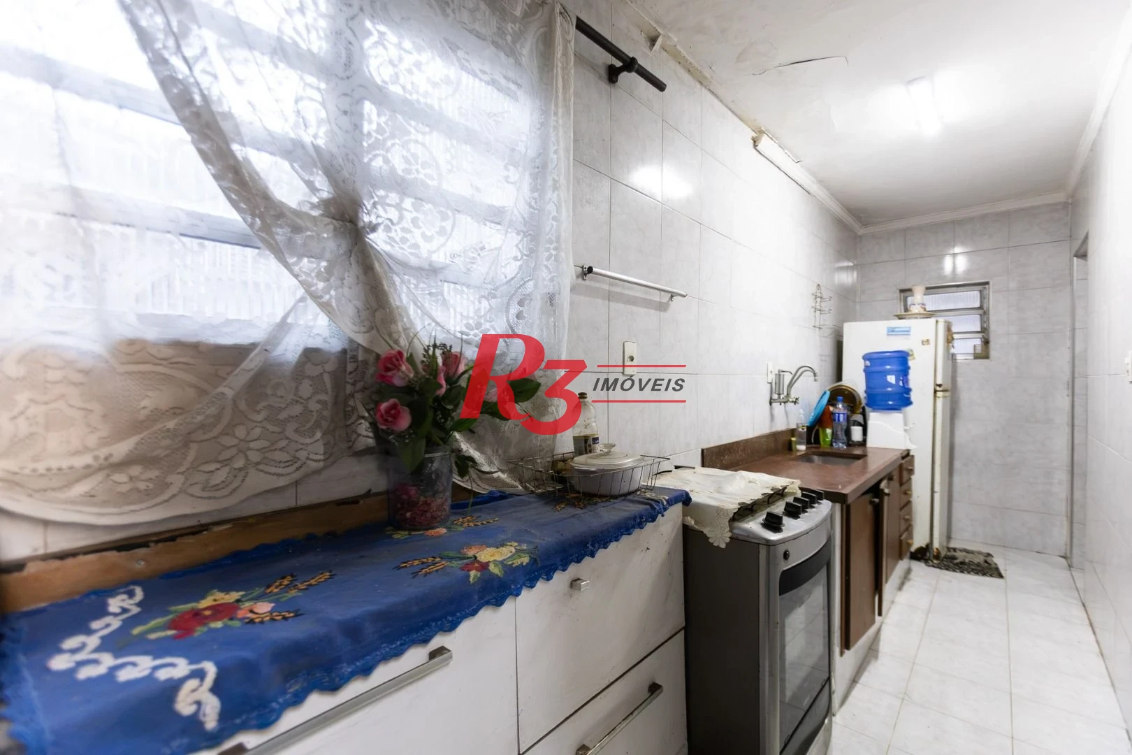 Sobrado com 3 dormitórios à venda, 220 m² por R$ 690.000,00 - Estuário - Santos/SP