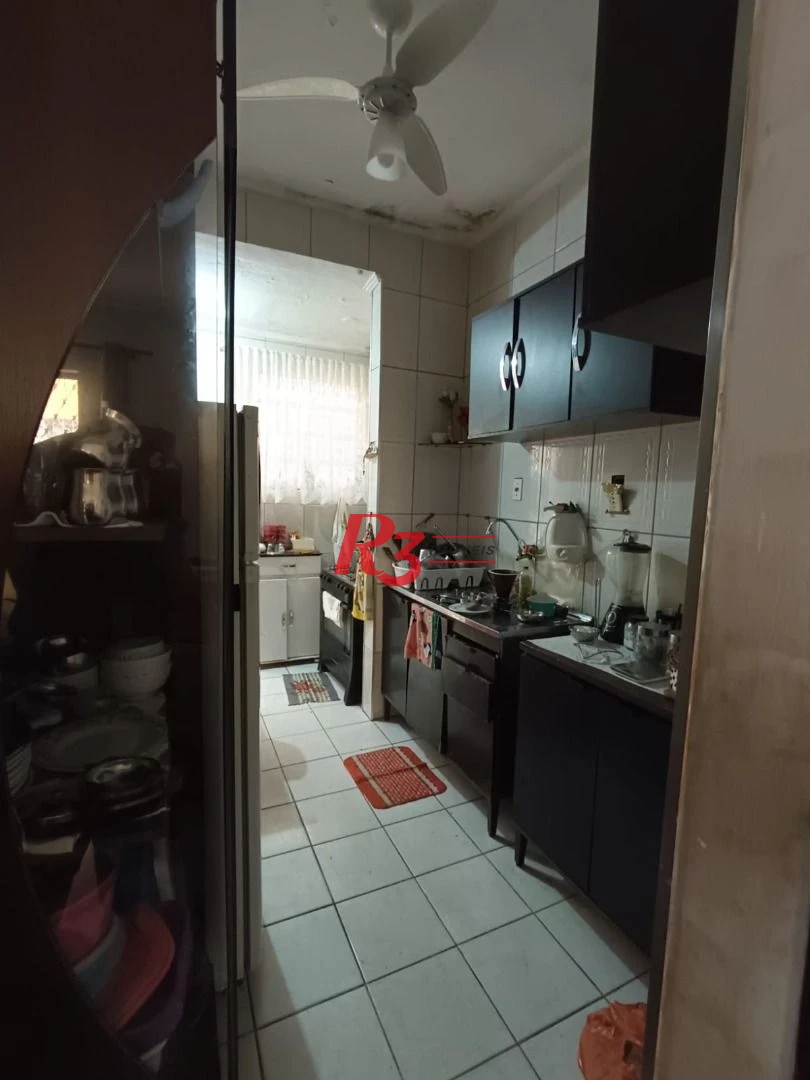 Casa com 3 dormitórios à venda, 68 m² por R$ 470.000,00 - Macuco - Santos/SP