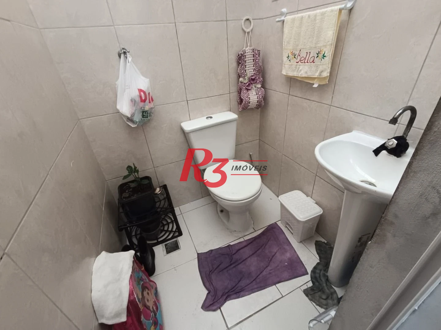 Casa com 3 dormitórios à venda, 68 m² por R$ 470.000,00 - Macuco - Santos/SP