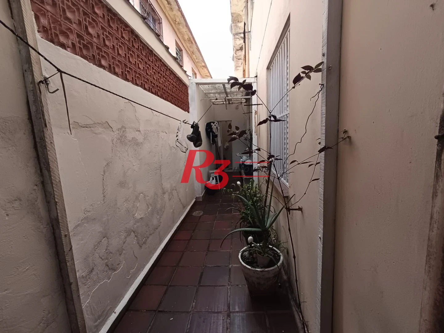 Casa com 3 dormitórios à venda, 68 m² por R$ 470.000,00 - Macuco - Santos/SP