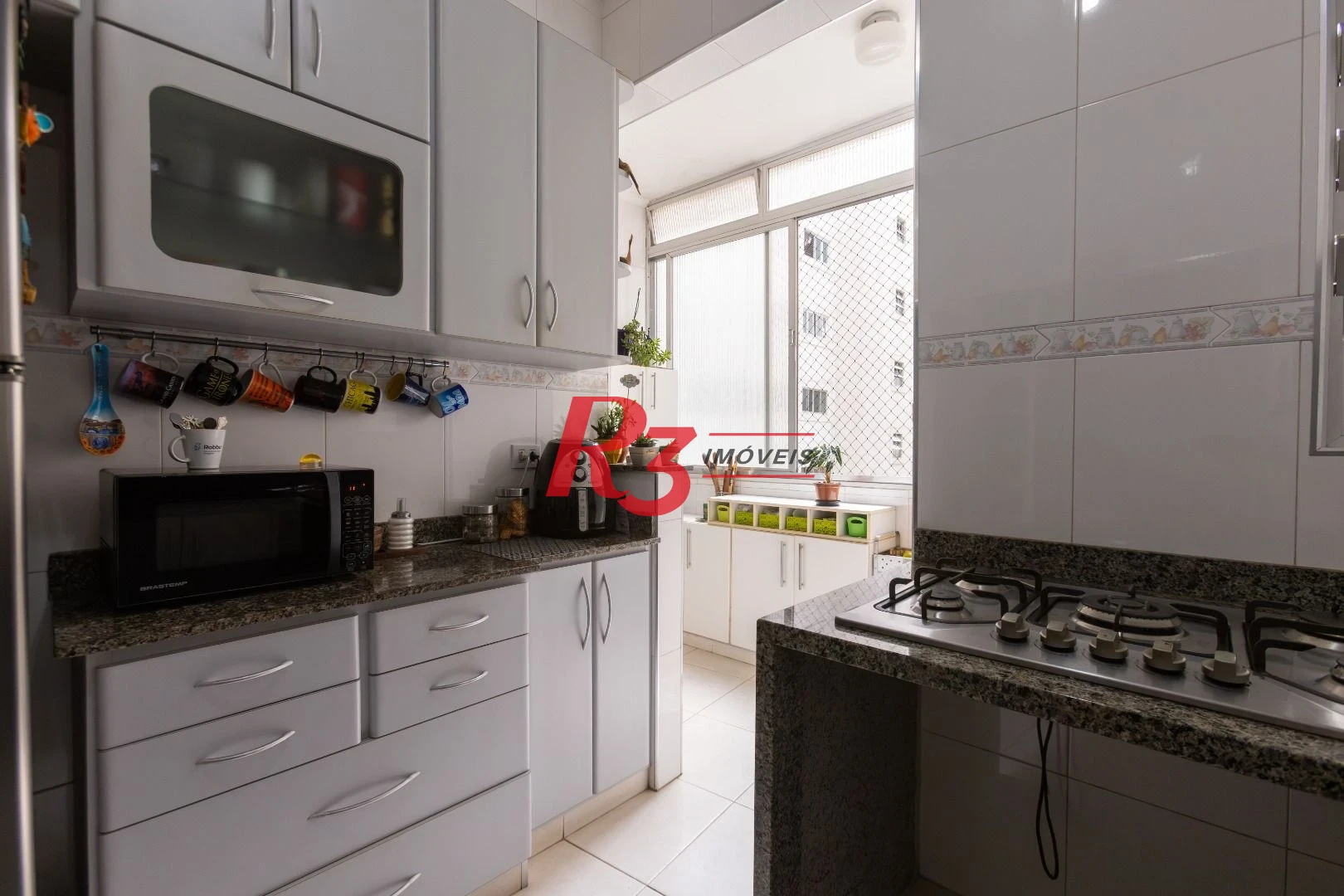 Apartamento com 3 dormitórios à venda, 114 m² por R$ 750.000,00 - Embaré - Santos/SP