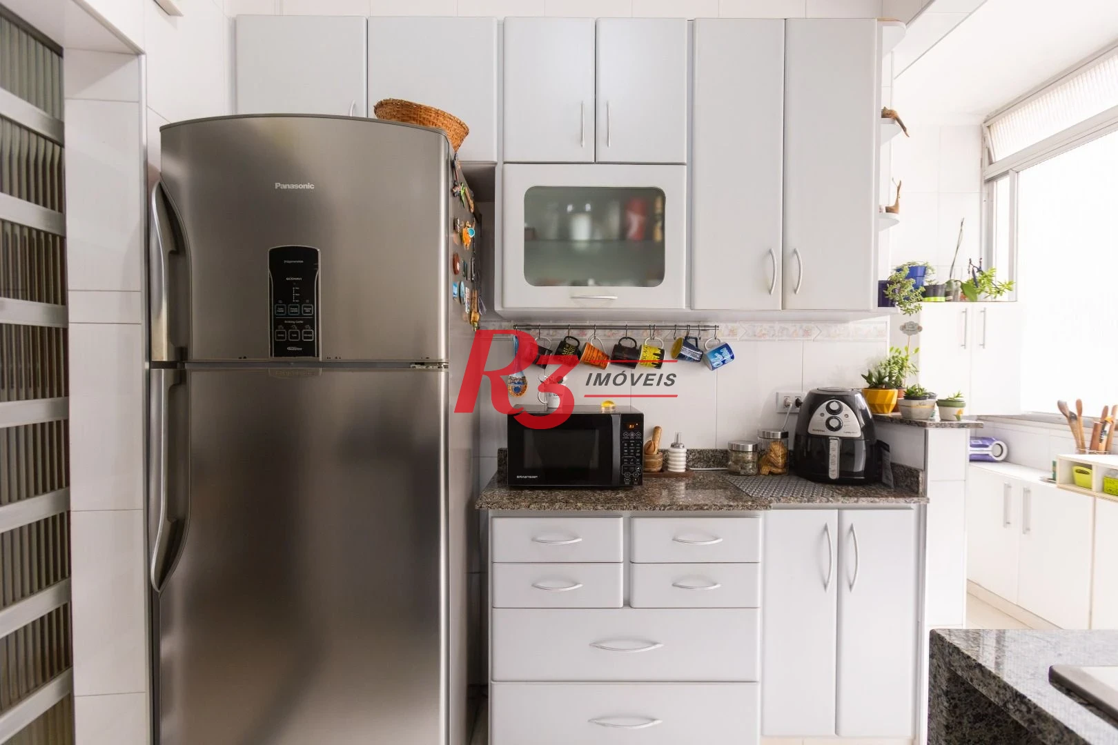 Apartamento com 3 dormitórios à venda, 114 m² por R$ 750.000,00 - Embaré - Santos/SP