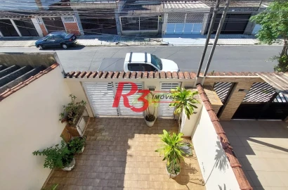 Sobrado com 3 dormitórios à venda, 147 m² por R$ 850.000,00 - Vila Valença - São Vicente/SP