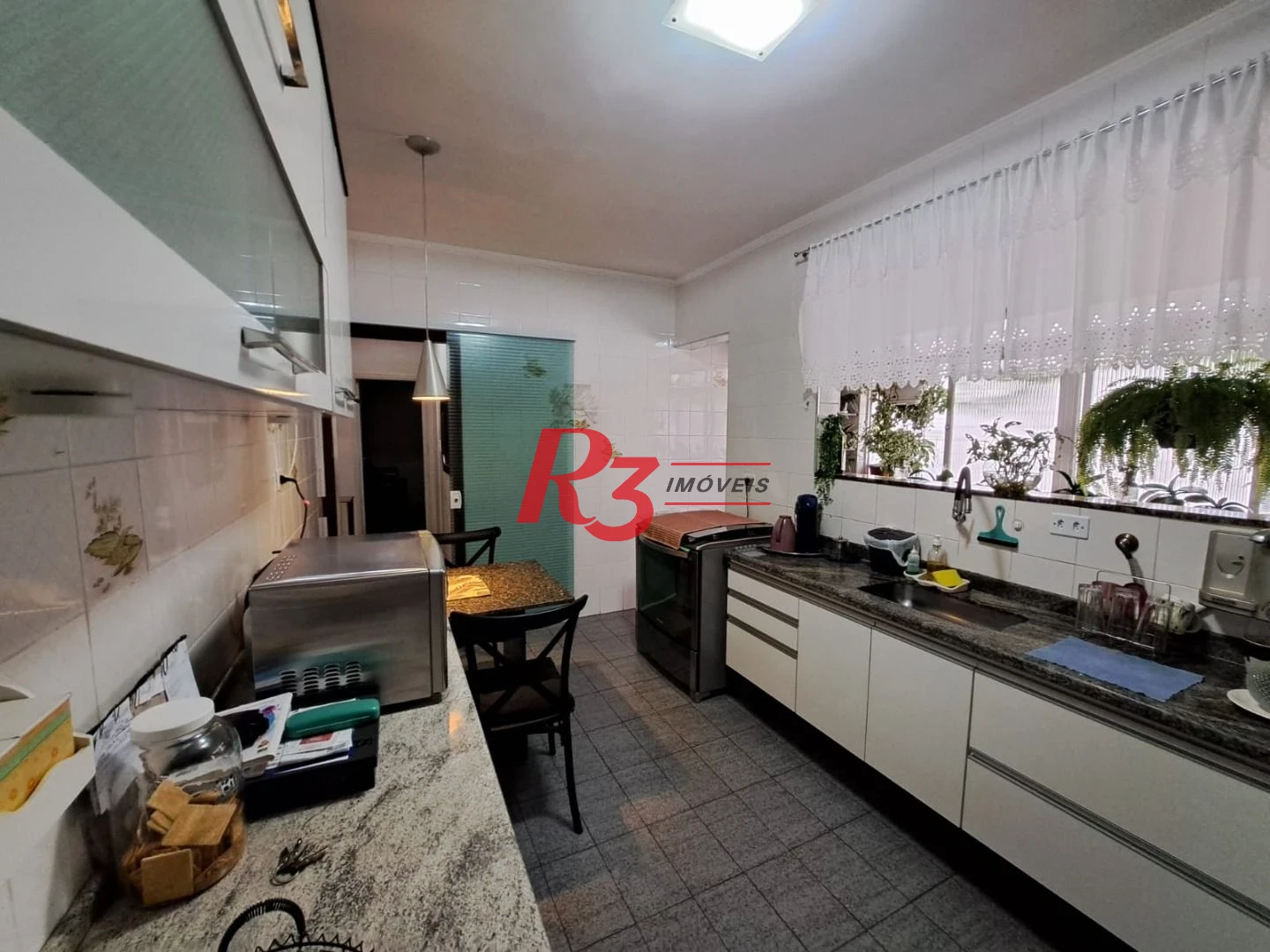 Apartamento com 3 dormitórios à venda, 103 m² por R$ 620.000,00 - Ponta da Praia - Santos/SP