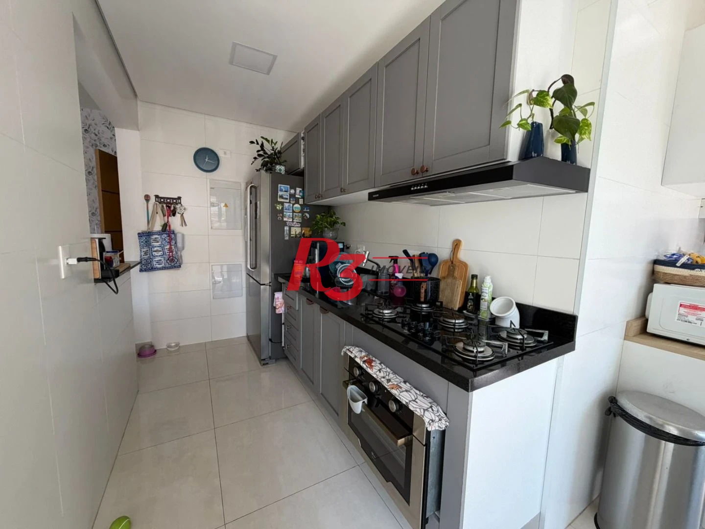 Apartamento com 2 dormitórios à venda, 74 m² por R$ 1.050.000,00 - Gonzaga - Santos/SP