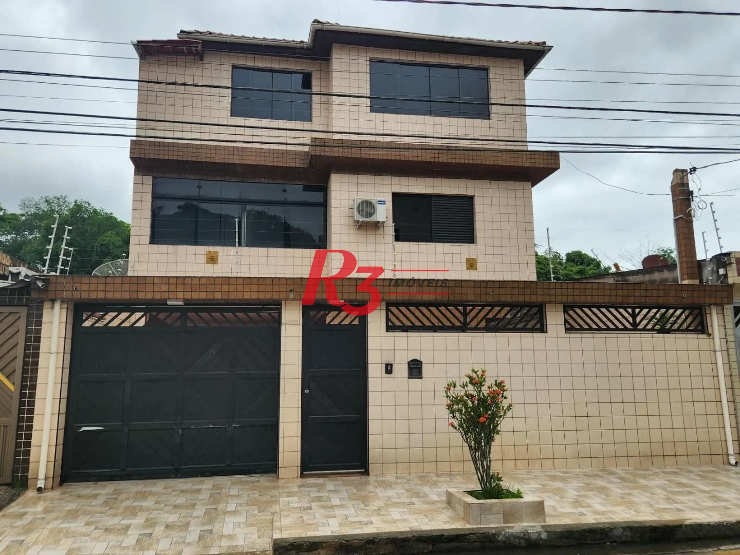 Casa triplex com 4 dormitórios à venda, 320 m² por R$ 880.000 - Bom Retiro - Santos/SP
