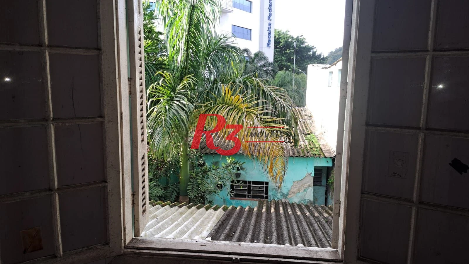 Casa com 3 dormitórios à venda, 200 m² por R$ 1.300.000,00 - Vila Belmiro - Santos/SP